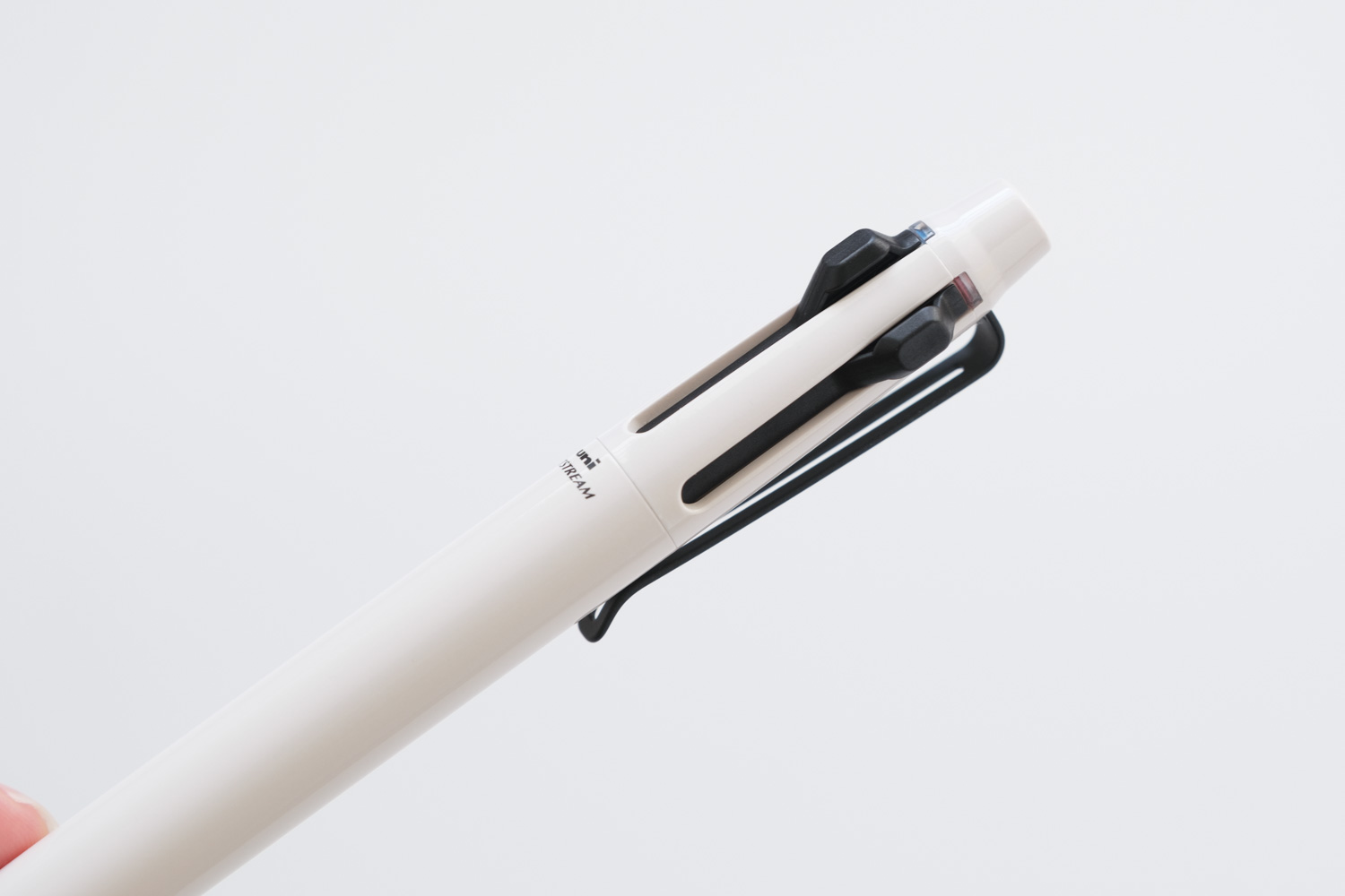 ジェットストリームプライム3色ボールペン ベージュ（SXE3330005.45）のスライドノック棒のデザイン